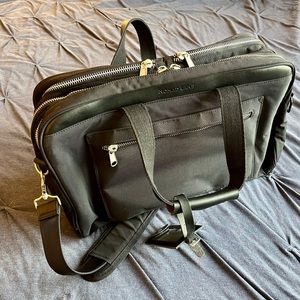 Brand new black Nomad Lane messenger bag - great for travelers